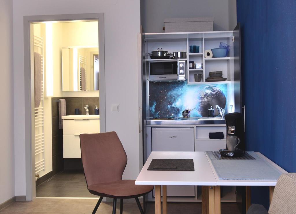Kuchyň nebo kuchyňský kout v ubytování Aparthotel-Stadtallendorf