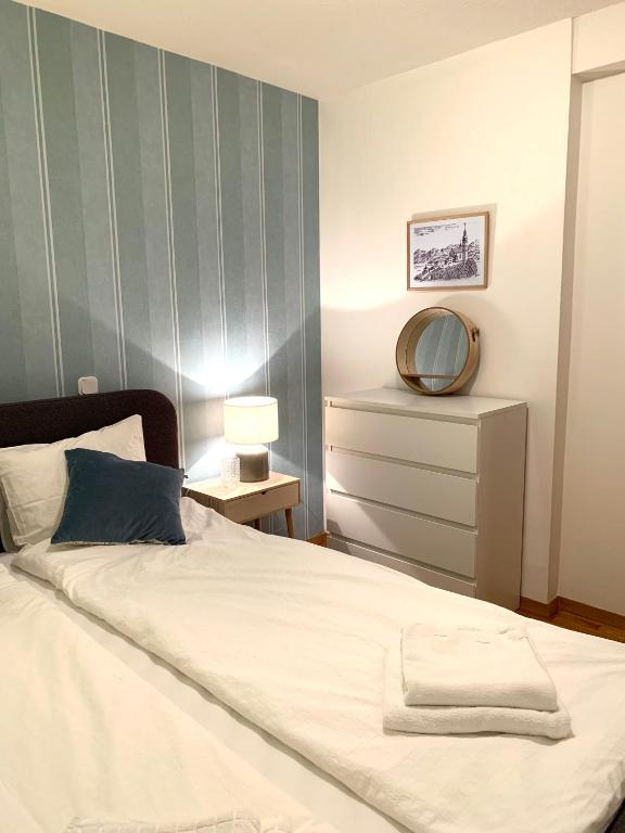 Postel nebo postele na pokoji v ubytování Apartment Center