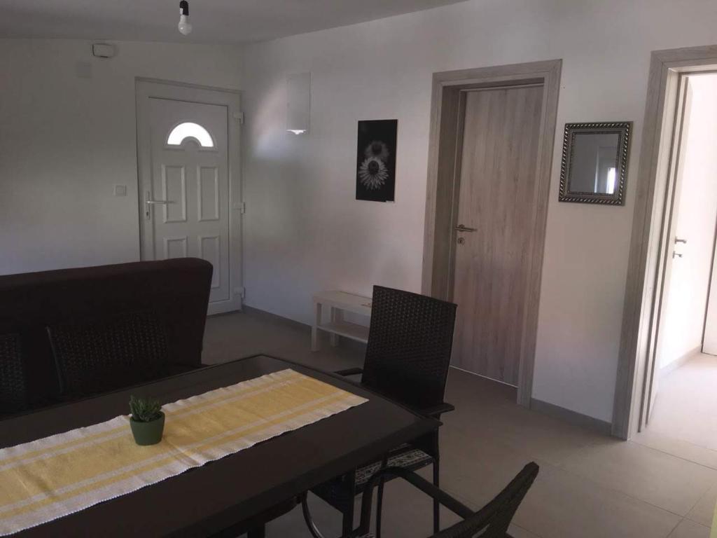 Posedenie v ubytovaní Apartman Bunarić