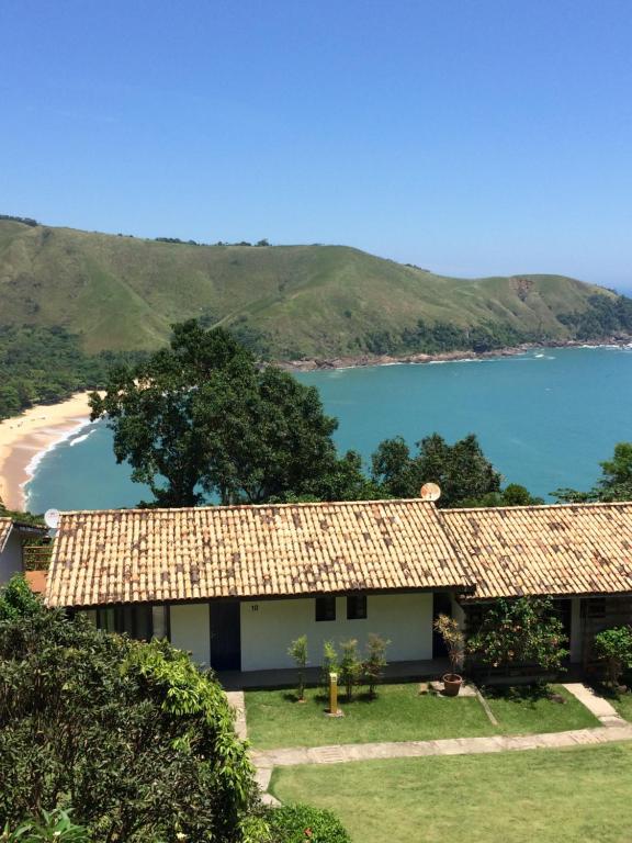a house with a view of a beach at Casa praia vista mar ttg in Toque Toque Grande