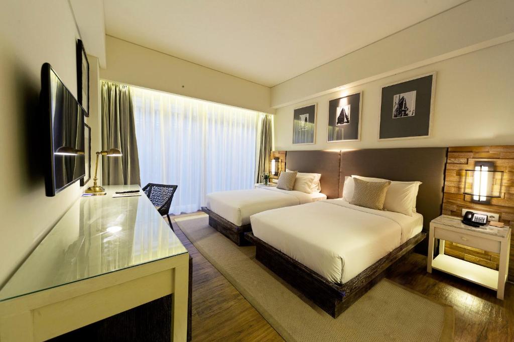 TV a/nebo společenská místnost v ubytování Bali Paragon Resort Hotel