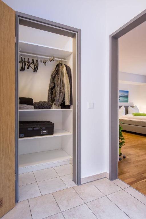 Postel nebo postele na pokoji v ubytování City Appartements Villach