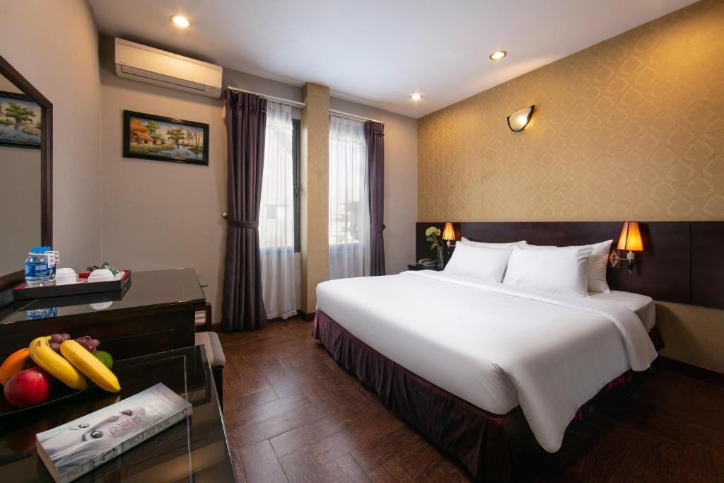Postel nebo postele na pokoji v ubytování Sen Hotel - Managed by Sen Hotel Group