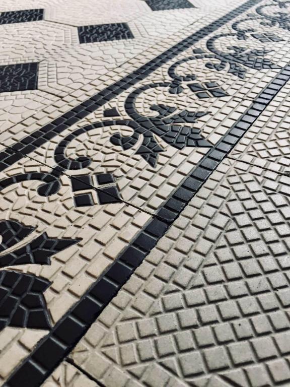 a tile floor with a design on it at Residence Liberty in Trieste