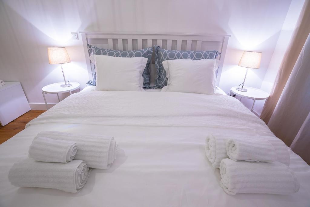 Posteľ alebo postele v izbe v ubytovaní Deluxe Apartment Talia