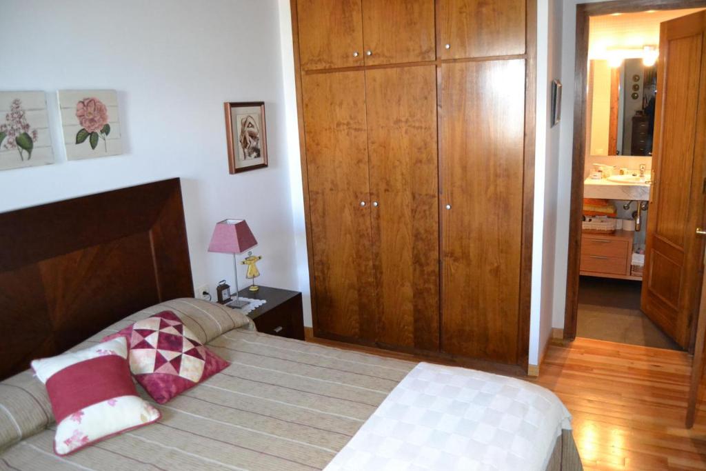 Postel nebo postele na pokoji v ubytování Dúplex en el centro de Alp