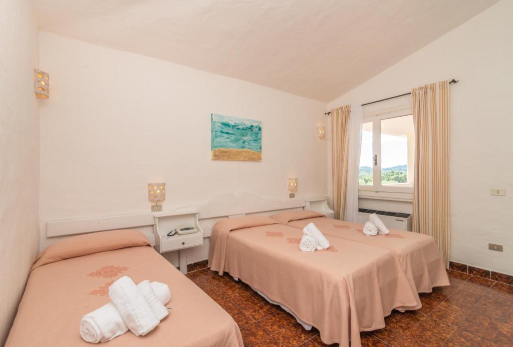 Postel nebo postele na pokoji v ubytování Hotel 3 Botti