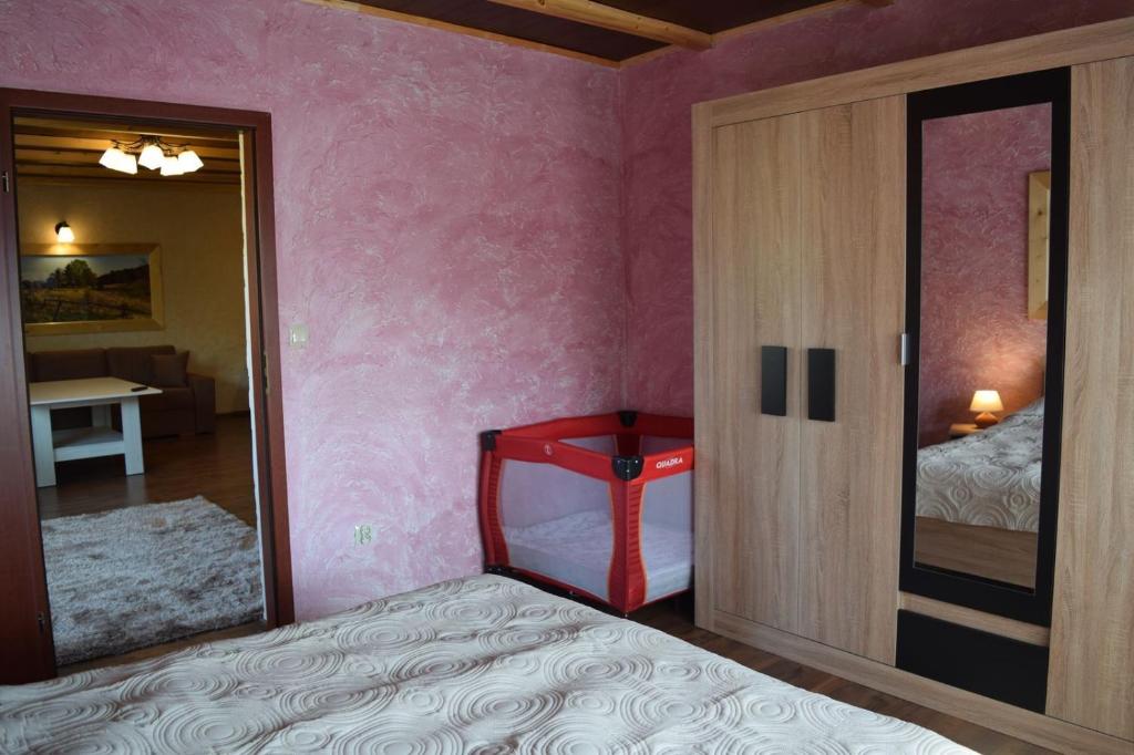 Łóżko lub łóżka w pokoju w obiekcie Apartamenty Bahus - Centrum