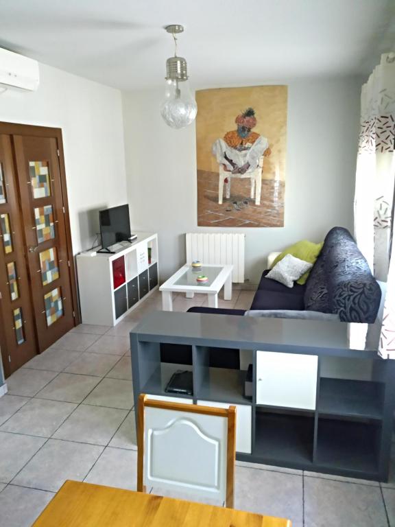 TV a/nebo společenská místnost v ubytování Piso La Torre