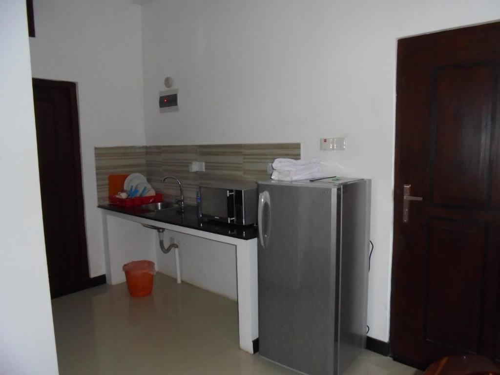 Kuchyň nebo kuchyňský kout v ubytování JMF Hotel