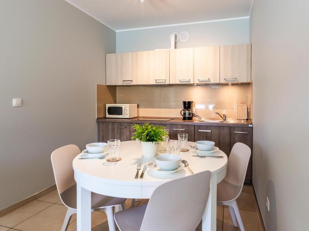 Kuchyňa alebo kuchynka v ubytovaní VacationClub - Aquarius Apartament 93