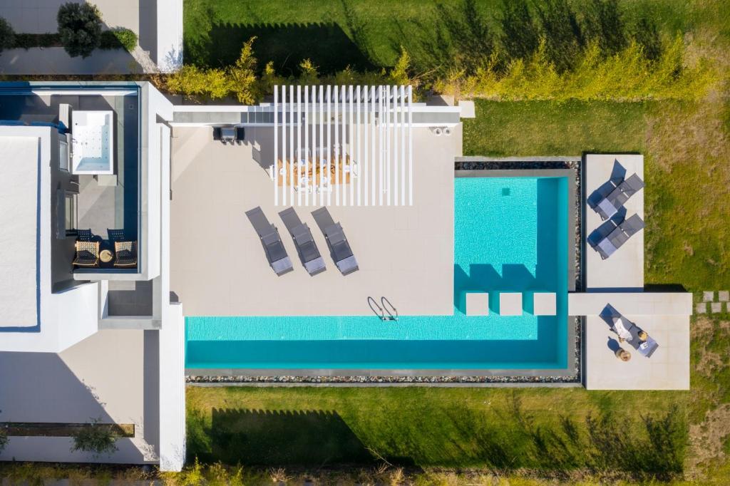Bazén v ubytovaní Albatross Beach Front Villas alebo v jeho blízkosti