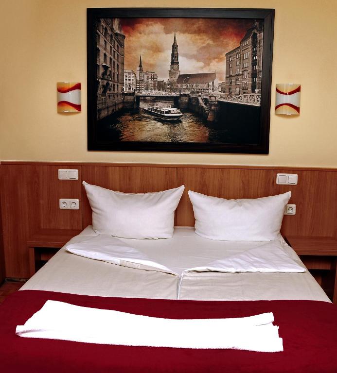 Postel nebo postele na pokoji v ubytování Altan Hotel