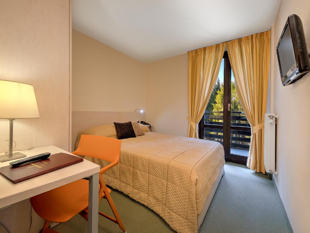 TV a/nebo společenská místnost v ubytování Hotel Alaska