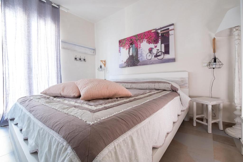 Postel nebo postele na pokoji v ubytování B&B A Pochi Passi
