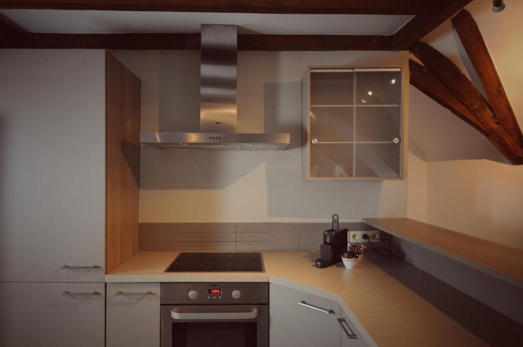 Kuchyň nebo kuchyňský kout v ubytování B&B Stillant