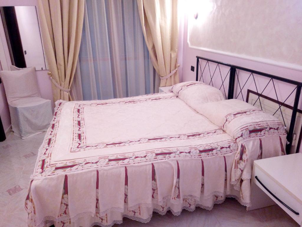 Posteľ alebo postele v izbe v ubytovaní HOTEL AL QUERCETO