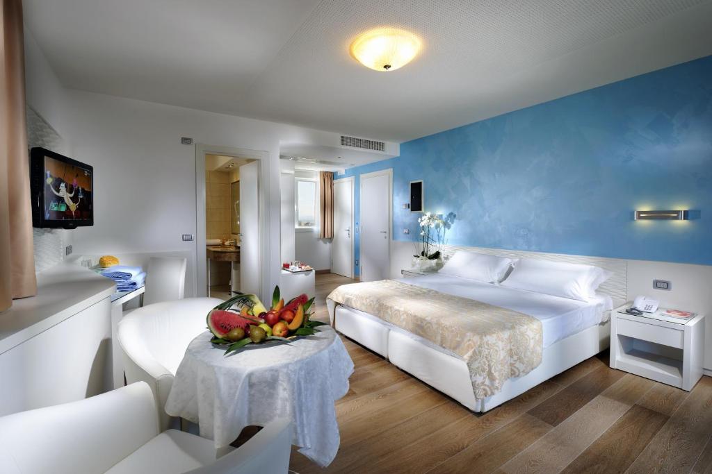 Postel nebo postele na pokoji v ubytování Grand Hotel Playa