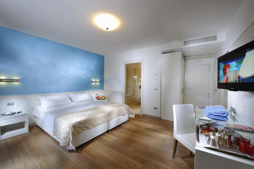 Postel nebo postele na pokoji v ubytování Grand Hotel Playa