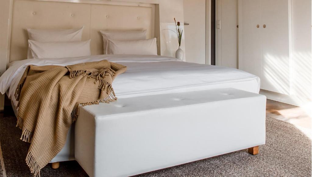 Postel nebo postele na pokoji v ubytování Hotel Gerbermühle