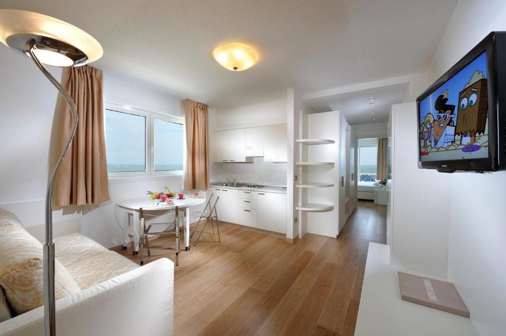 TV a/nebo společenská místnost v ubytování Grand Hotel Playa