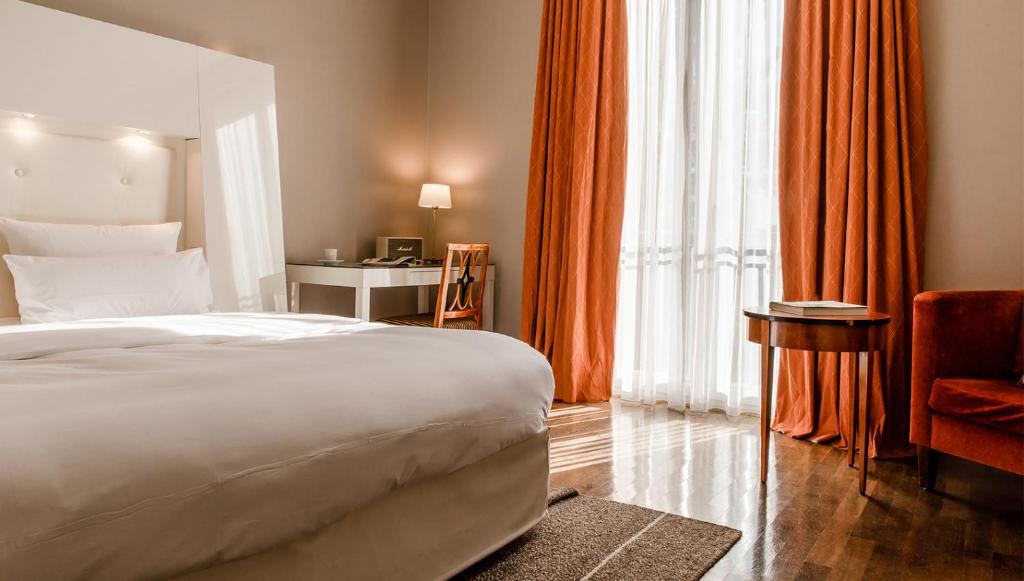 Postel nebo postele na pokoji v ubytování Hotel Gerbermühle