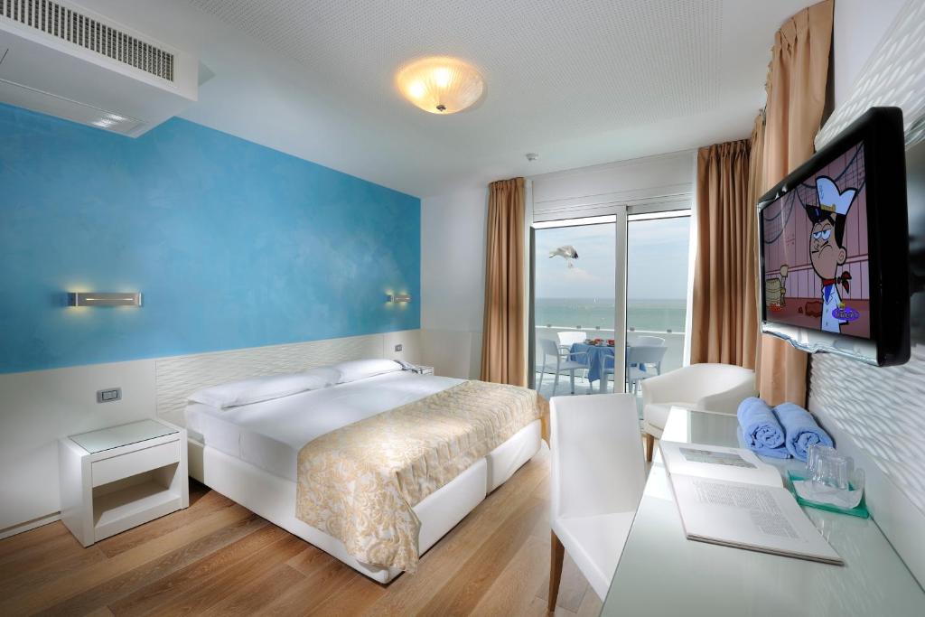 Postel nebo postele na pokoji v ubytování Grand Hotel Playa