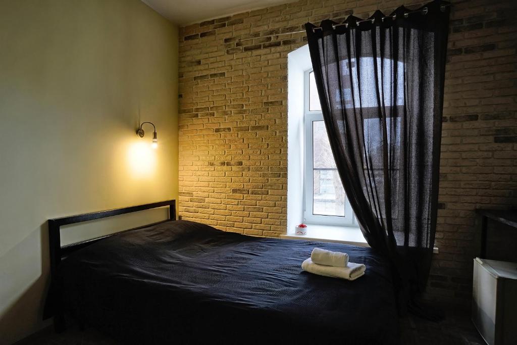 
Кровать или кровати в номере Невский 147
