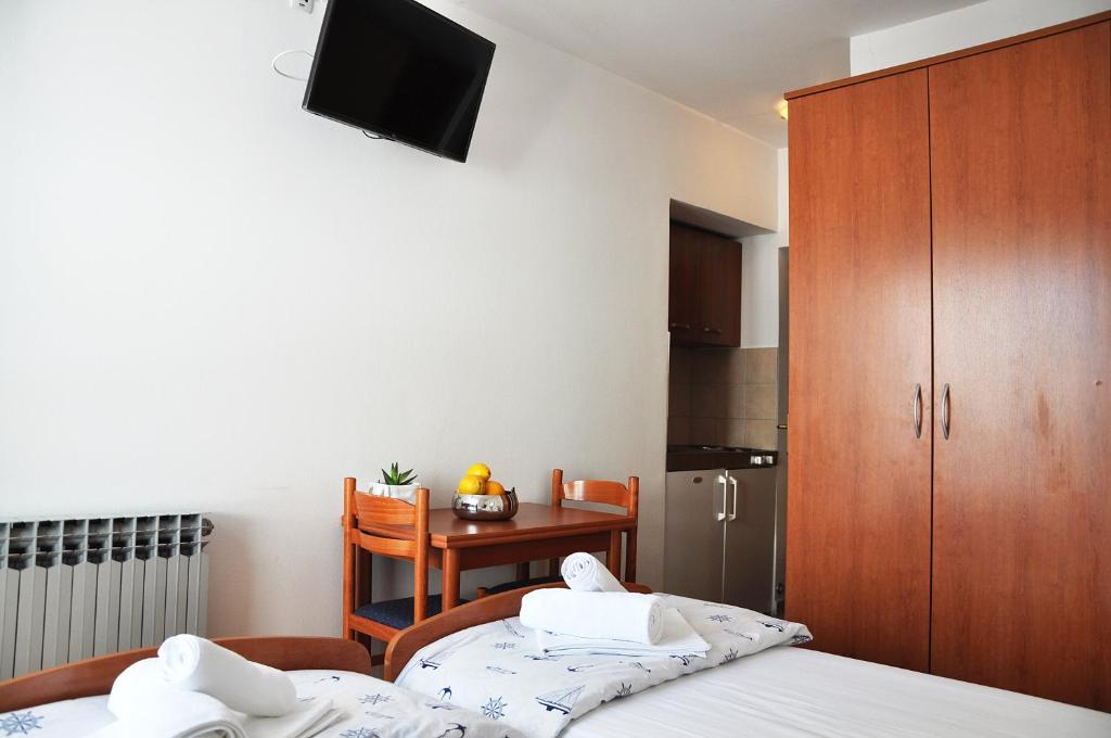 Posteľ alebo postele v izbe v ubytovaní Sunrise Apartments and Studio Apartments