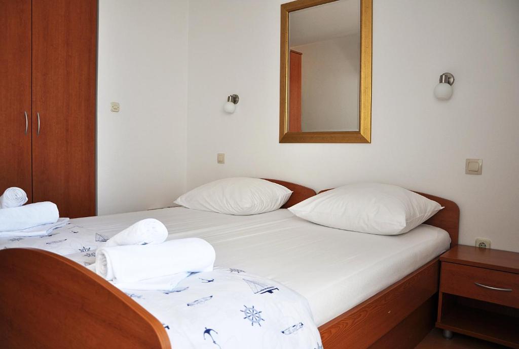 Posteľ alebo postele v izbe v ubytovaní Sunrise Apartments and Studio Apartments