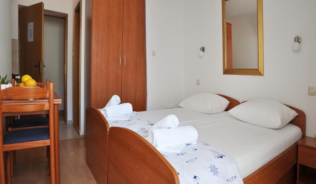 Posteľ alebo postele v izbe v ubytovaní Sunrise Apartments and Studio Apartments