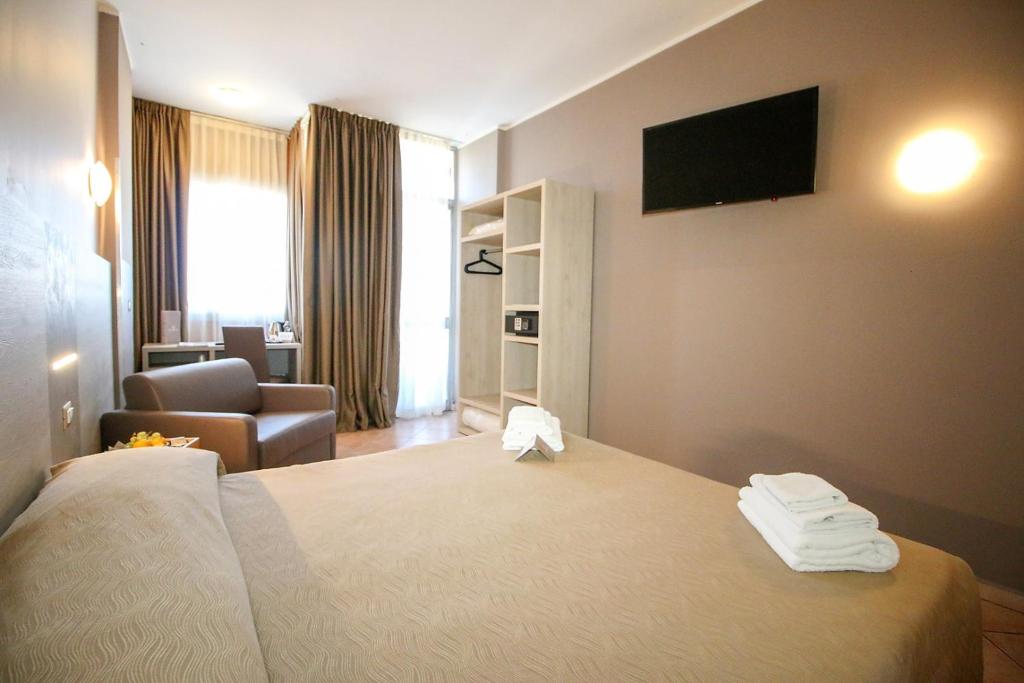 TV a/nebo společenská místnost v ubytování Hotel Miramonti