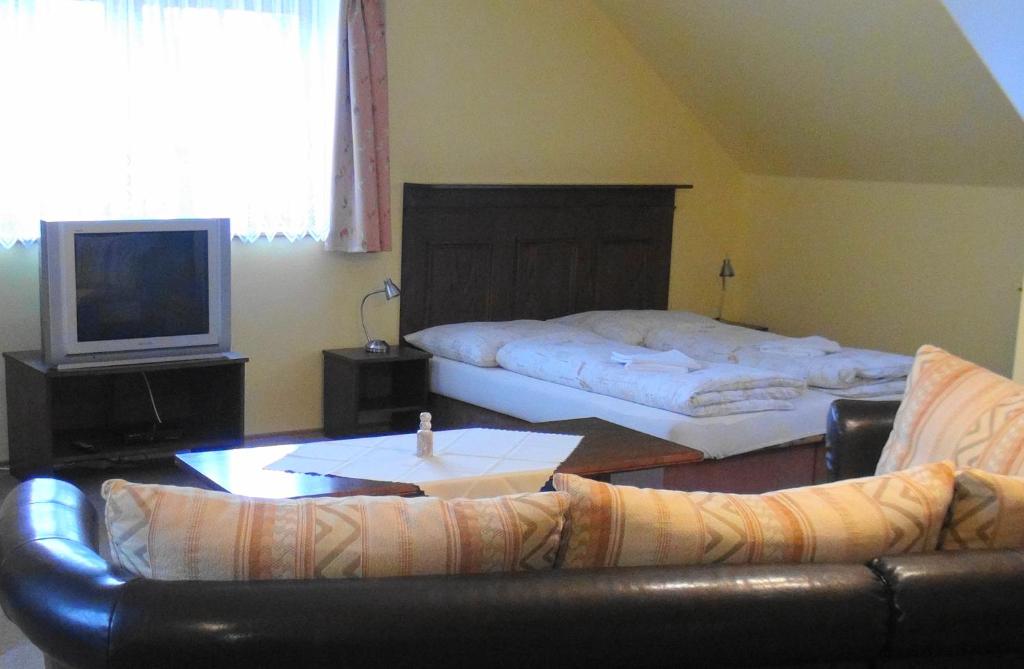 Postel nebo postele na pokoji v ubytování Apartmány Florian