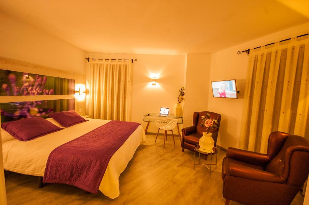 Postel nebo postele na pokoji v ubytování Hotel Hc Zoom