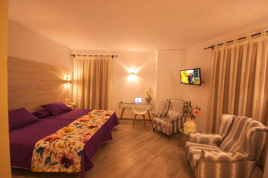 TV a/nebo společenská místnost v ubytování Hotel Hc Zoom