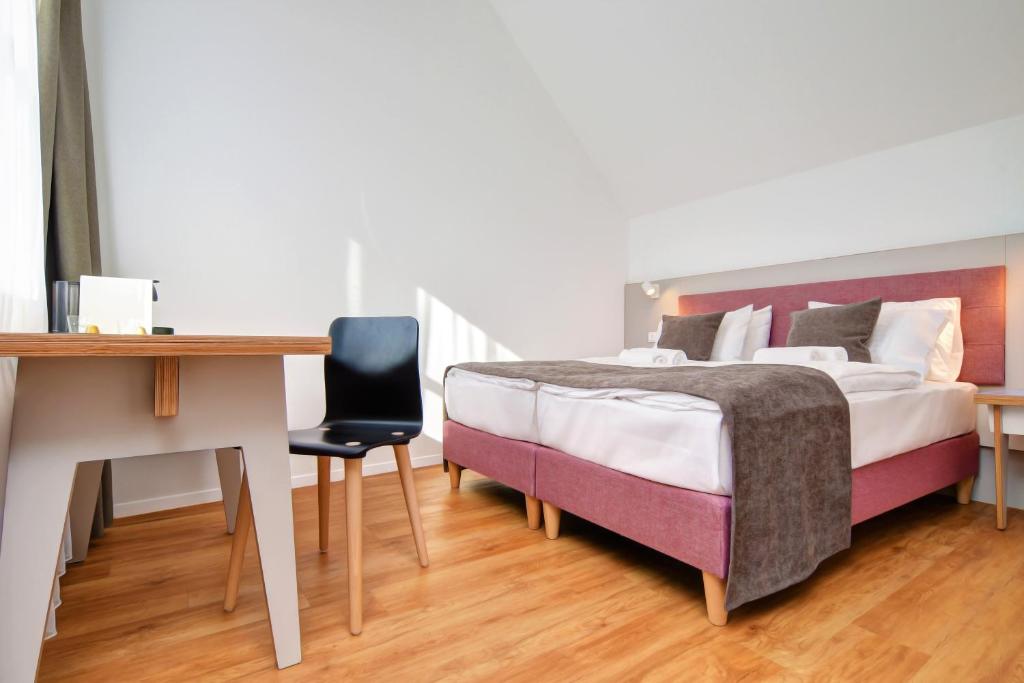 Postel nebo postele na pokoji v ubytování Fekete Sas Motel