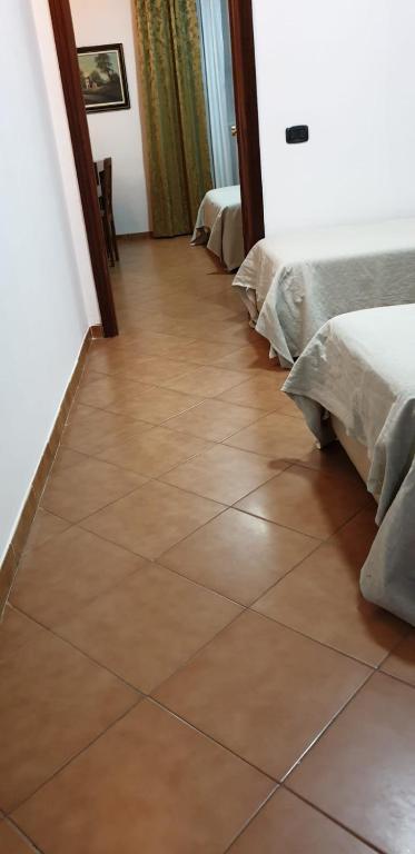 Postel nebo postele na pokoji v ubytování Grand Hotel Pavone