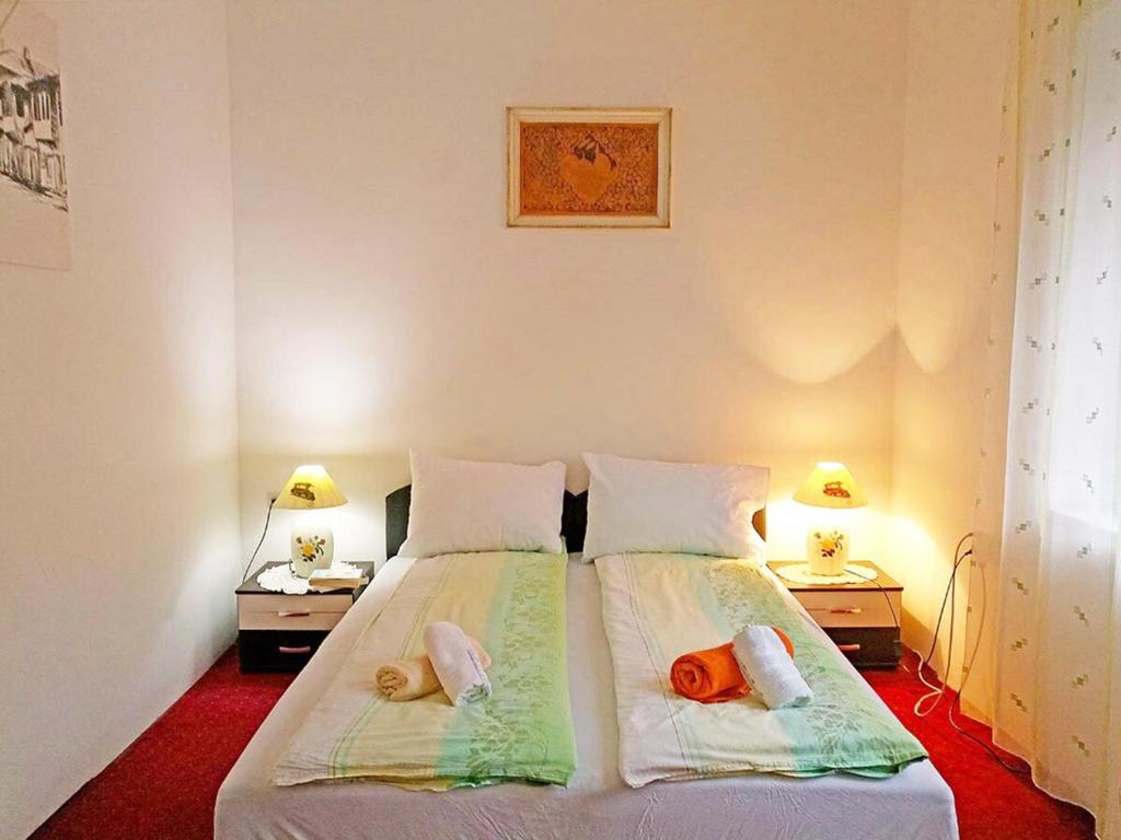 Letto o letti in una camera di Sarajevo Rooms