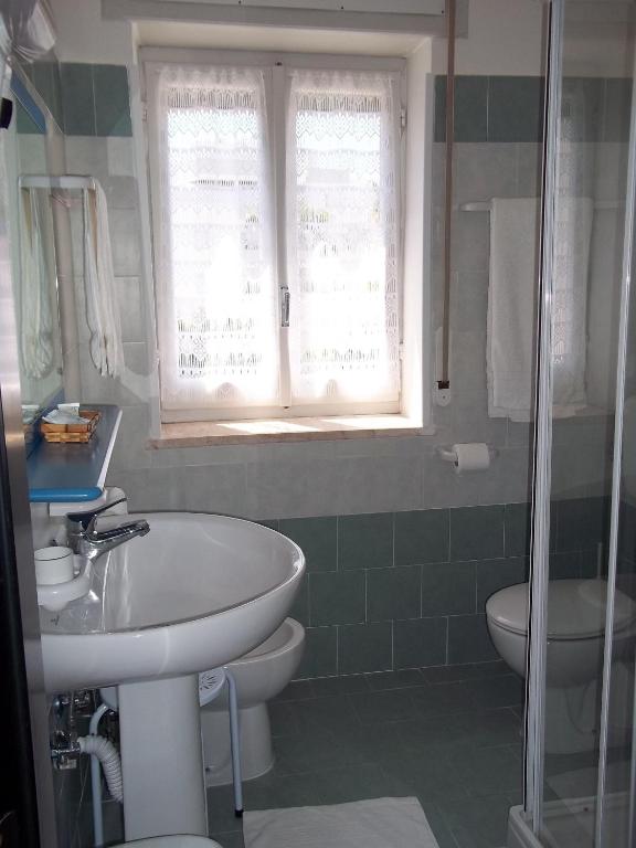 Koupelna v ubytování Hotel Rivabella