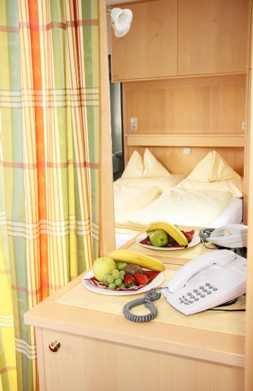 Postel nebo postele na pokoji v ubytování Hotel-Restaurant Stefanihof