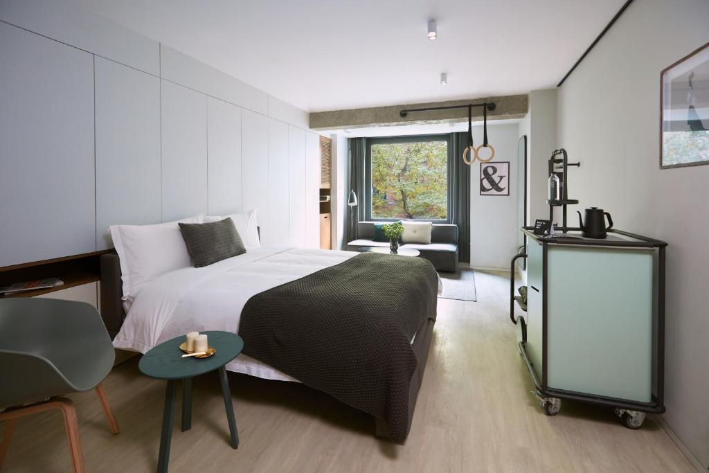 Postel nebo postele na pokoji v ubytování Stey Beijing Wangfujing Hotel