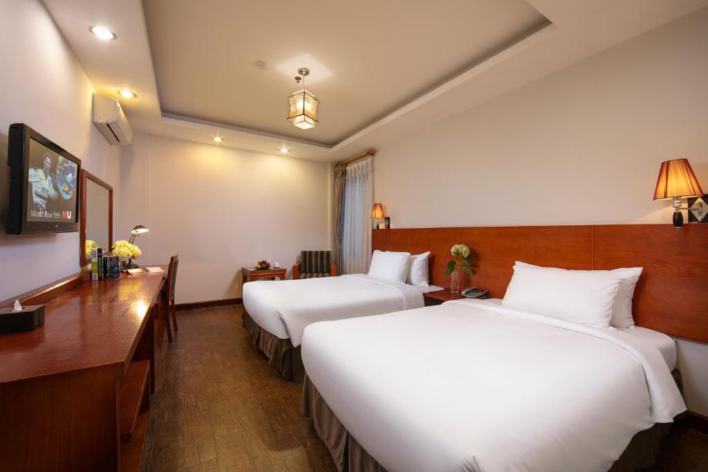 Postel nebo postele na pokoji v ubytování Sen Luxury Hotel - Managed by Sen Hotel Group