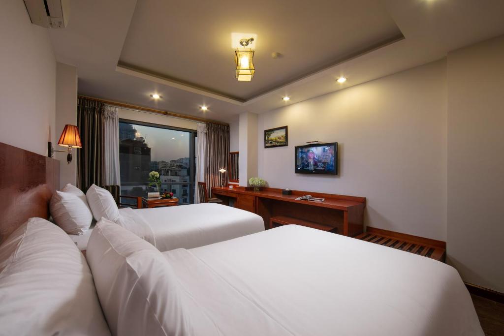Postel nebo postele na pokoji v ubytování Sen Luxury Hotel - Managed by Sen Hotel Group