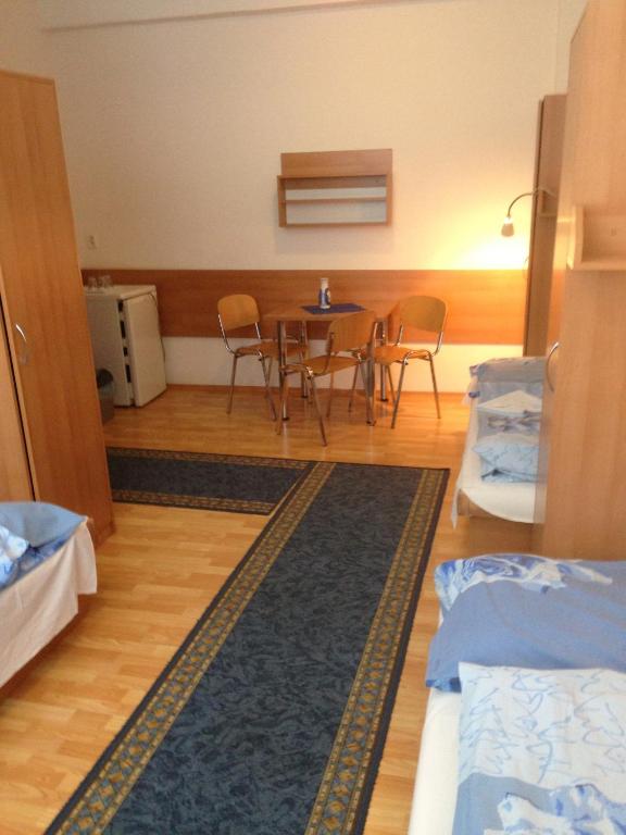 Postel nebo postele na pokoji v ubytování Hotel Prim