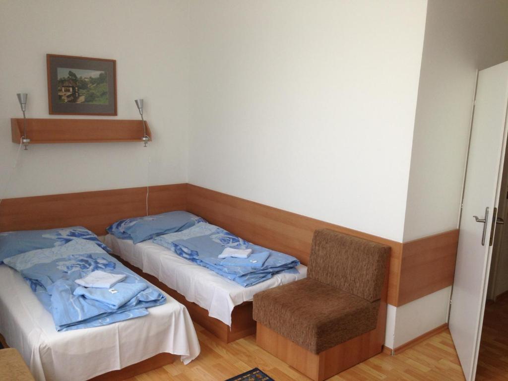Postel nebo postele na pokoji v ubytování Hotel Prim
