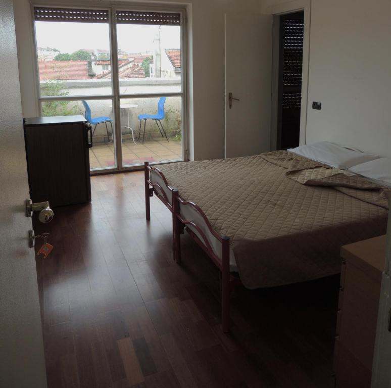 Postel nebo postele na pokoji v ubytování Star Hostel