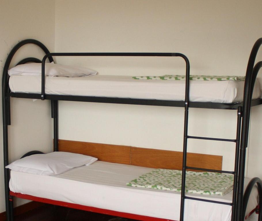 Postel nebo postele na pokoji v ubytování Star Hostel