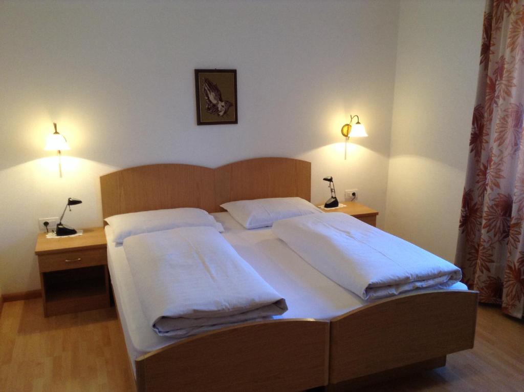 Postel nebo postele na pokoji v ubytování Alpenblick Bed & Breakfast