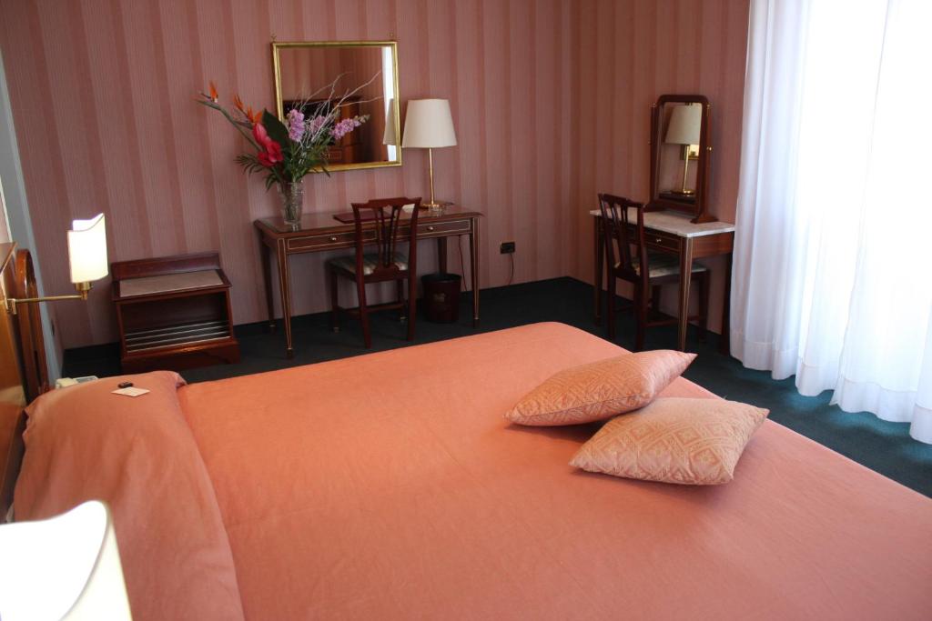 Postel nebo postele na pokoji v ubytování Hotel Esplanade