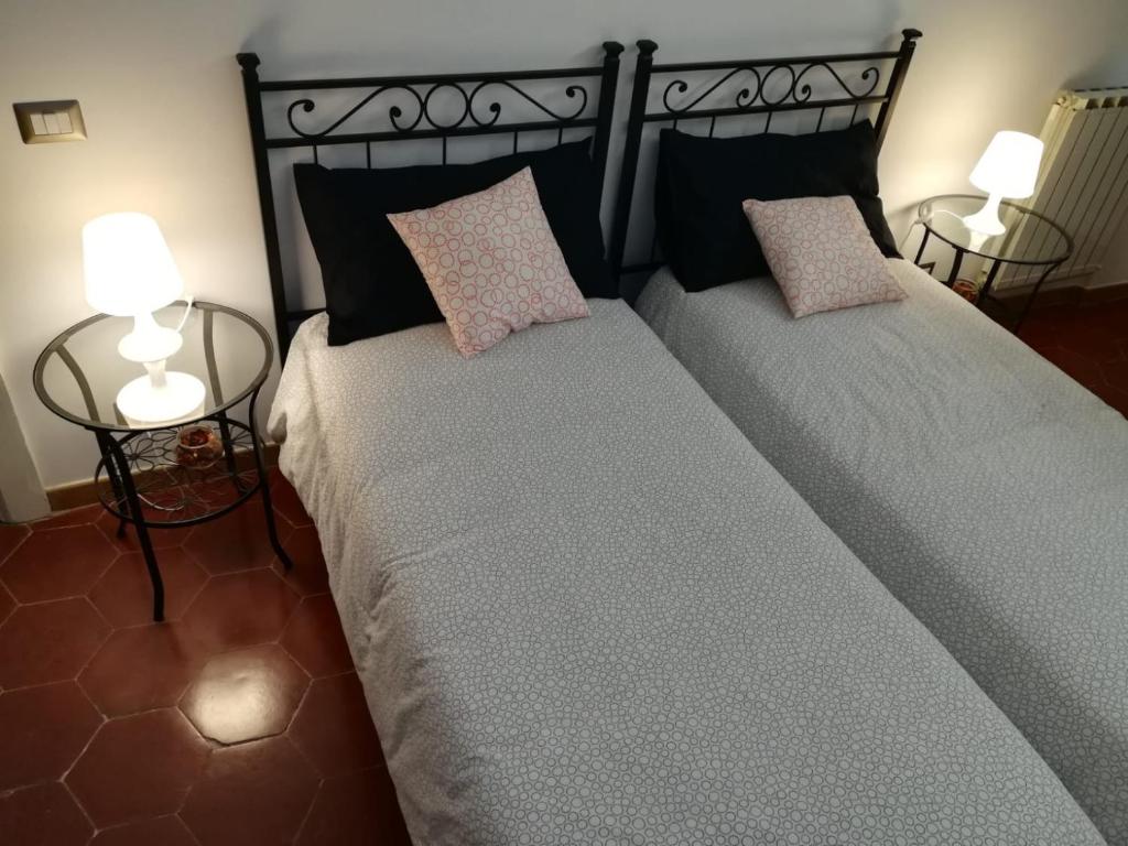 Кровать или кровати в номере Da Vittoria